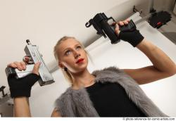 NIKOL STANDING POSE WITH TWO GUNS